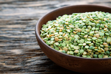 Chopped peas in a clay bowl.