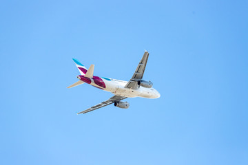 Airplane take off from airport. Travel by air, climate crisis, transportation