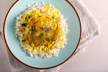 Spicy chicken thigh with gravy and rice