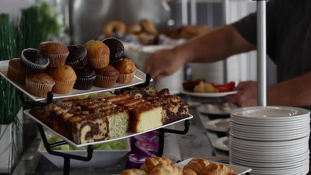 Buffet with cakes and muffins