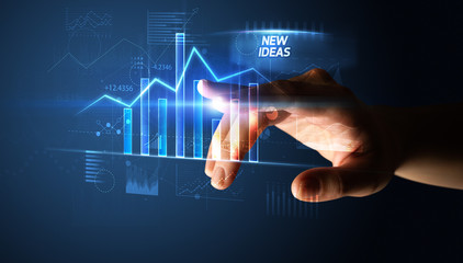 Hand touching NEW IDEAS button, business concept