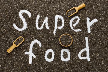 Written word super food on a background of Chia seeds