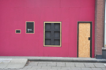 Fototapeta na wymiar red brick wall and window