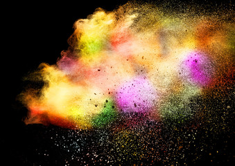Abstract multicolor powder on black background. holi festival.