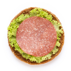 Sandwich with salami sausage on white background.