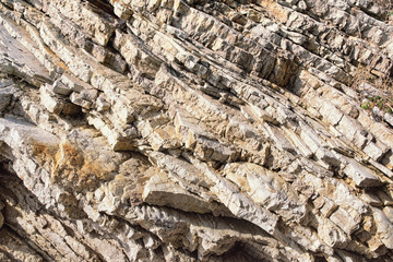 Texture of sheer cliff, abstract stone background.  Dinaric Alps mountains, Montenegro