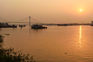 Fototapeta na wymiar View of sunset on Hooghly or Ganga. Kolkata. India