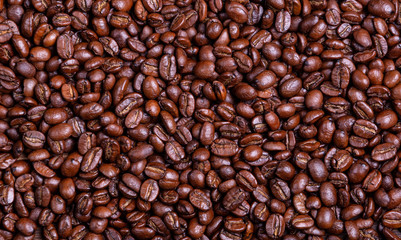 Roasted coffee beans. Close-up. Coffee background.
