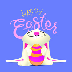 smiling easter rabbit holding a decorated egg