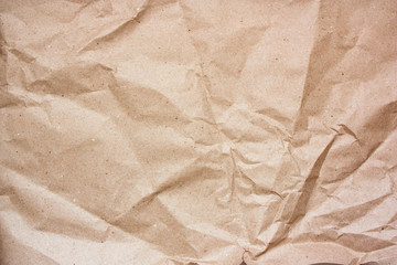 Brown crumpled paper texture.  Kraft paper background.