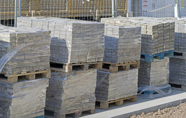 Tile blocks on pallets lie next to each other