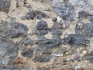 wall made of exposed multicoloured stones