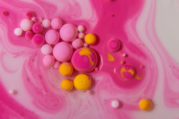 Bright and colourful abstract background from acrylic paints and oil