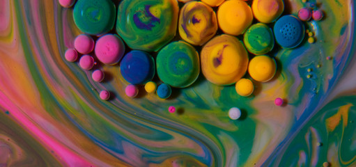 Bright and colourful abstract background from acrylic paints and oil