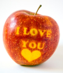 Red apple with the word and heart