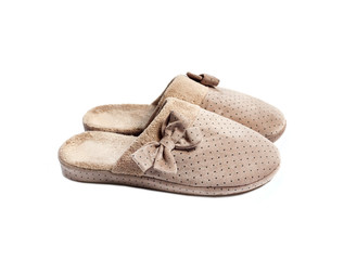 Beige house slippers isolated on white background