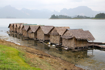 Fototapeta na wymiar The hut hay on raft in Cheow Lan Dam is vintage from rest at thailand