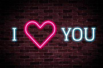 I love you neon banner on brick wall background, advertising text, sale promotion,luminous signboard, nightly.