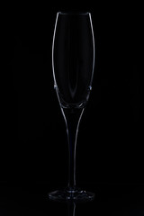 Close up view of  contour of a beautiful  slim, tall and elegant champagne glass isolated on a...