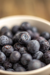 Close up macro shot of blueberries with shallow depth of field