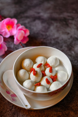 Tangyuan, Wolfberry and flowers on the table