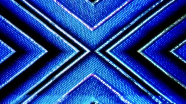 Analog retro style visuals with brightness variations, symetrical pattern and fast moving detailed pattern.