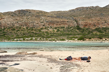 Fototapeta na wymiar Greece, Crete, Balos Lagoon, May 22, 2019: tourists enjoy balos lagoon beachin Crete island in Greece.