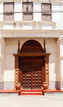 Beautiful wooden door with Arabic culture element in Stone town, Zansibar island, Tansania - a UNESCO heritage