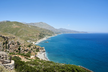 Fototapeta na wymiar Panorama of Preveli beach at Libyan sea, river and palm forest, southern Crete , Greece.
