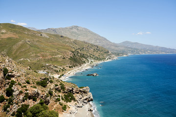 Fototapeta premium Panorama of Preveli beach at Libyan sea, river and palm forest, southern Crete , Greece.