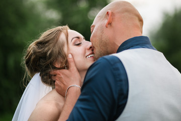 a couple in love kissing. husband and wife portrait photo