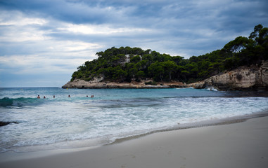 Fototapeta na wymiar Cala Mitjana beach in Menorca Ciutadella at Balearic Islands