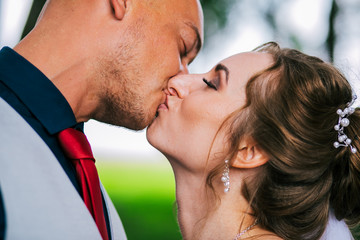 a couple in love kissing. husband and wife portrait photo