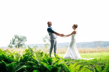 the couple on the nature.wedding photos of a beautiful couple on a walk