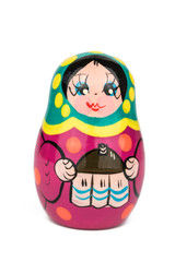 traditional souvenir violet matryoshka russian doll, with white background, isolated and close up