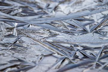 Surface of an frozen lake/pond. Close up.