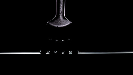 Concept. kitchen spatula. Black background, water, immersion.