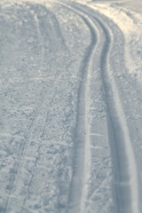 Ski track in snow , active winter holiday concept.