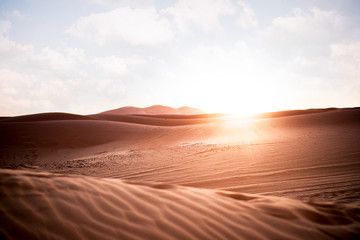 Fototapeta na wymiar Sonnenuntergang in der Sahara Wüste in Marokko