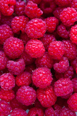 Fresh and sweet red raspberries background