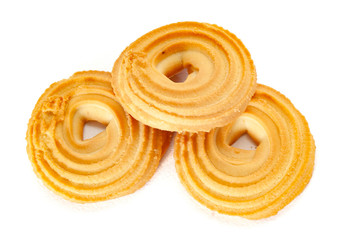 Round spritz shortbread isolated on white background. Danish butter cookies on white.