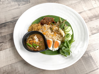  Shrimp paste sauce with crispy fried fish and sweet pork, Thai food concept