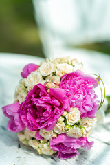 beautiful modern wedding bouquet on white blurred background. Closeup