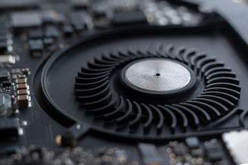black electronic fan, computer technology hardware macro shot, air ventilation system