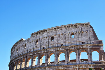 Fototapeta premium Colosseum in Rome, Italy. Magnificent architecture of Rome. Exterior details of the colosseum in Rome. Great Roman Colosseum, also known as the Flavian Amphitheatre