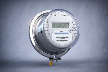 Digital electric meter with lcd screen  on grey dirty background. Electricity consumption concept.