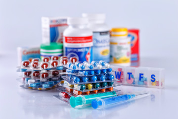 Drug prescription for treatment medication. Pharmaceutical medicament, cure in container for health. Pharmacy theme, capsule pills with medicine antibiotic in packages.