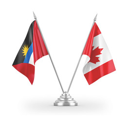 Canada and Antigua and Barbuda table flags isolated on white 3D rendering