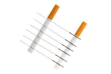 Acupuncture to stop smoking. Voodoo cigarettes. Acupuncture needles are on the cigarette. Traditional ancient Chinese medicine.