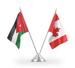 Canada and Jordan table flags isolated on white 3D rendering